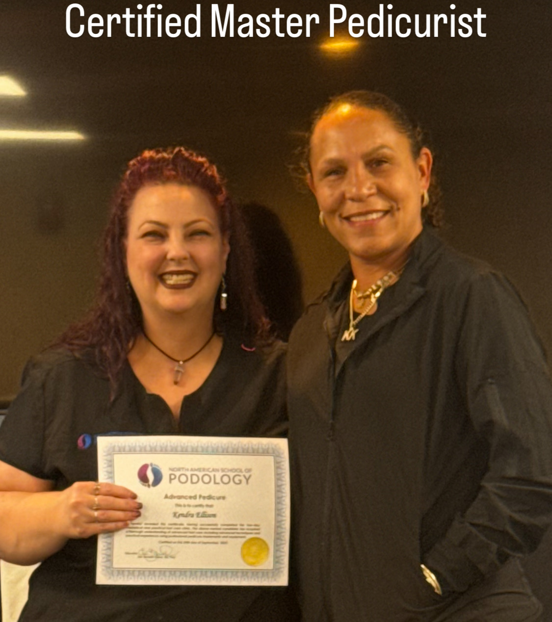 Kendra receiving her Certified Master Pedicurist certification